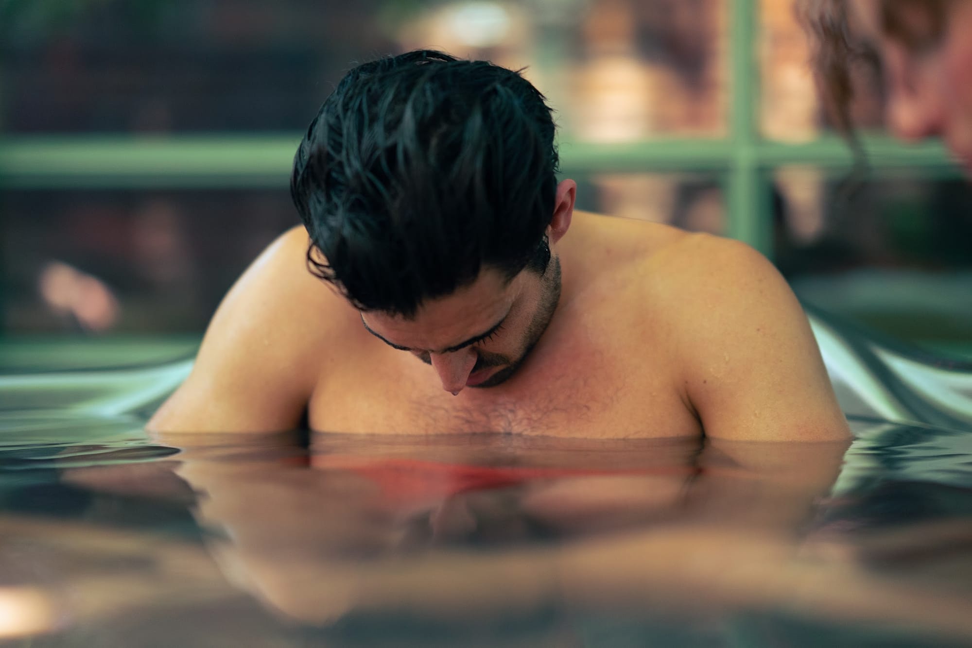 A guest taking a moment in a Koti cold plunge